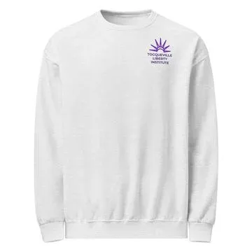 White crew neck sweatshirt with a small purple Tocqueville Liberty Institute sunburst emblem on the chest